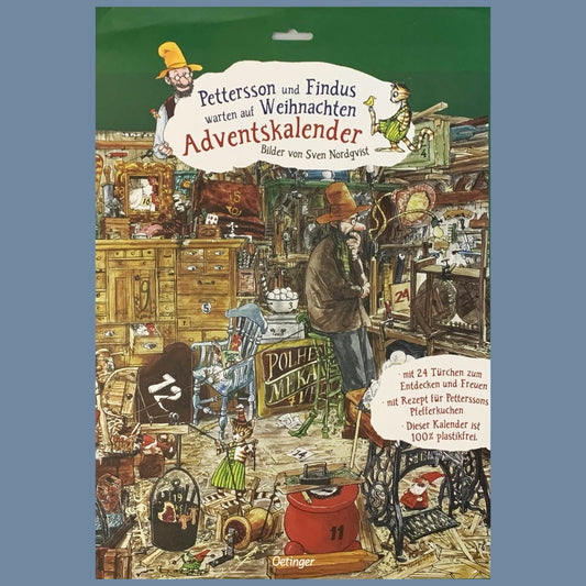 Vorderseite der Verpackung des Adventskalenders Pettersson mit grünem Hintergrund, man sieht den Tischlerschuppen