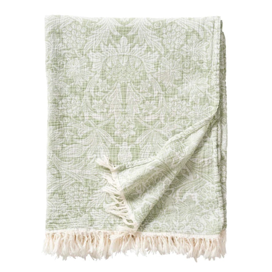 Baumwolldecke Sunflower in gruen zusammengefaltet mit Fransen an den Schmalseiten