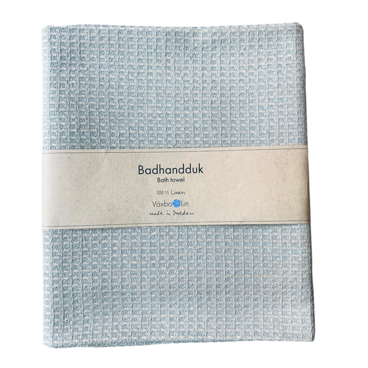 Badetuch Bubbel aus Leinen in hellblau zusammengefaltet mit Banderole