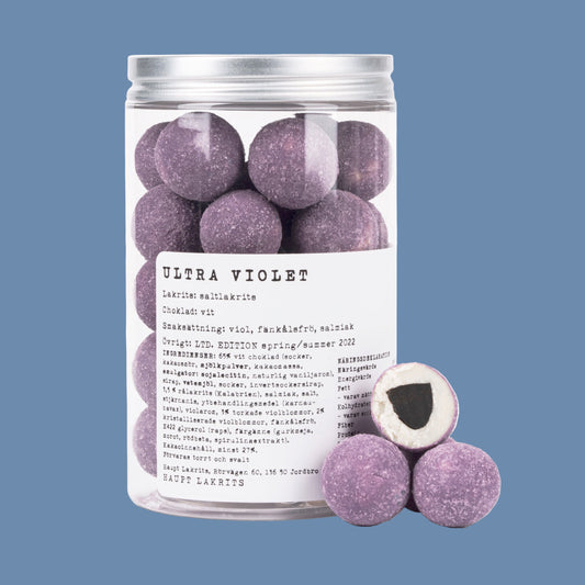 Transparente Dose mit lila Kugeln Lakritze und Schokolade Ultra Violet von Haupt Lakrits