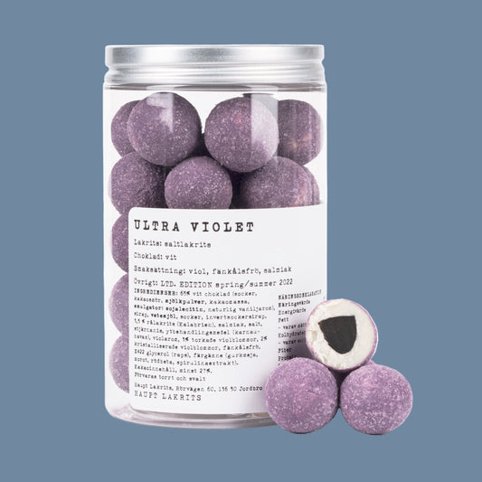 Transparente Dose mit lila Kugeln Lakritze und Schokolade Ultra Violet von Haupt Lakrits