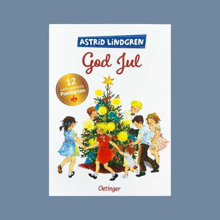 Vorderseite der Verpackung des Postkartensets God Jul mit Astrid Lindgren Geschichten die Bullerbükinder tanzen hier um den Weihnachtsbaum