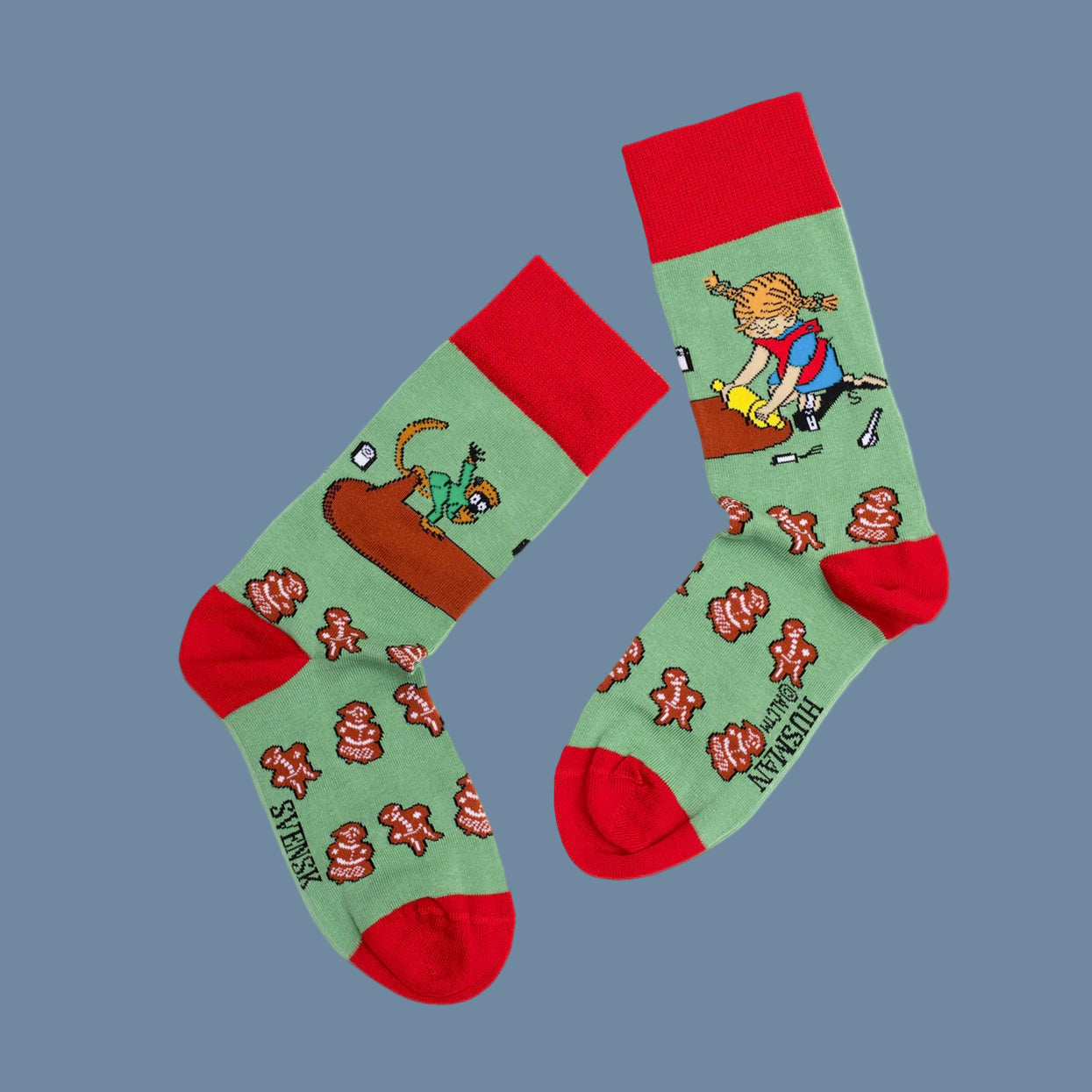 Grüne Socken Pippi bäckt Pfefferkuchen ausgebreitet mit roter Spitze, Ferse und Bündchen