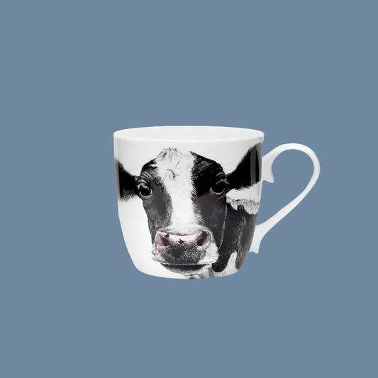 Tasse aus Porzellan mit Motiv Kuh Rosa von Charlotte Nicolin erhältlich bei Mys