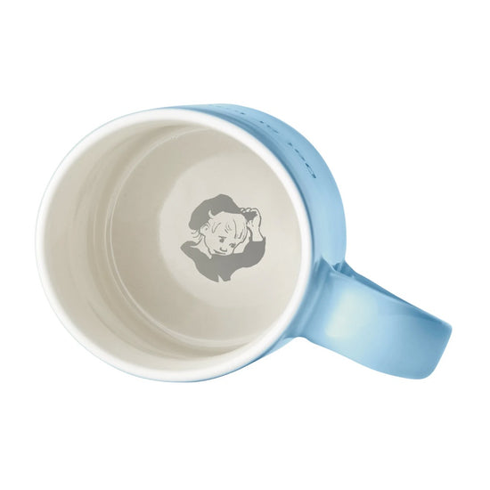 Hellblaue Tasse aus Steingut mit Blick nach Innen, wo Michels Konterfei auf dem Boden zu sehen ist