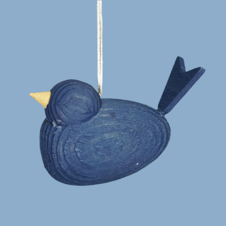 Vogel aus Holz mit Band in dunkelblau