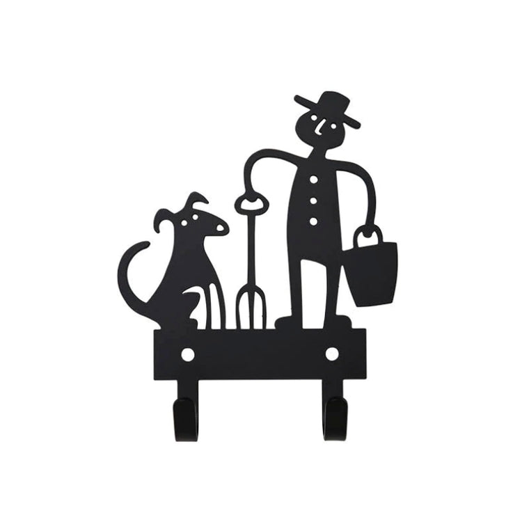Haken aus Metall in schwarz mit Gärtner und Hund von Bengt und Lotta