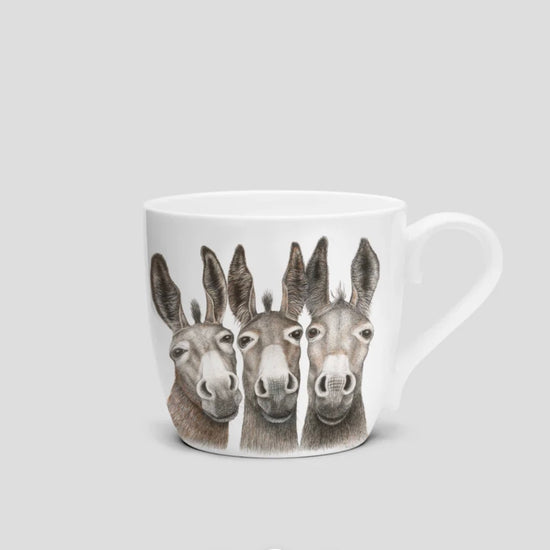 Tasse aus Porzellan mit Eseln auf Vorder- und Rückseite