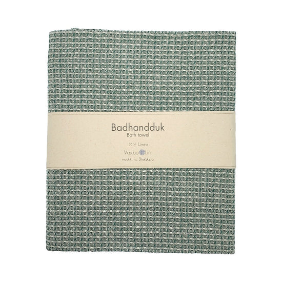 Badetuch Bubbel aus Leinen moos zusammengefaltet mit Banderole