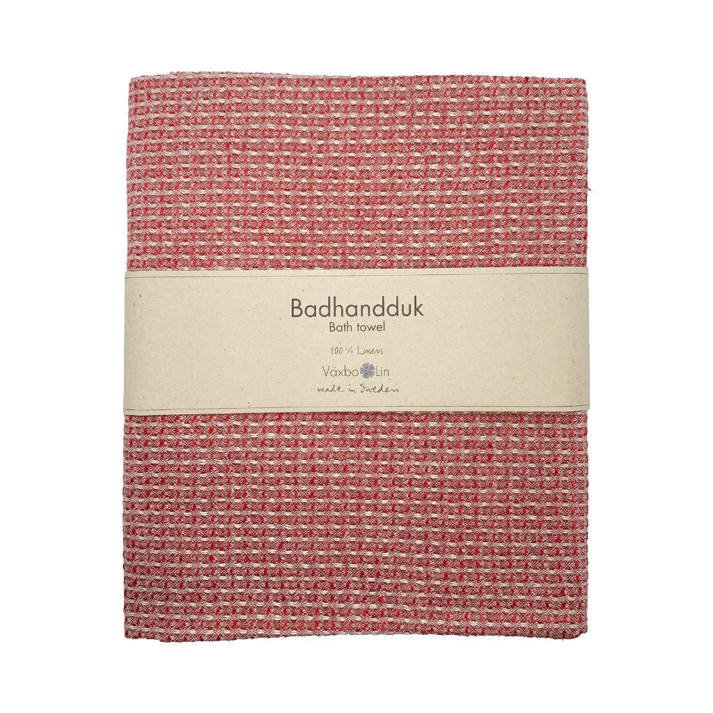 Badetuch Bubbel aus Leinen rot zusammengefaltet mit Banderole