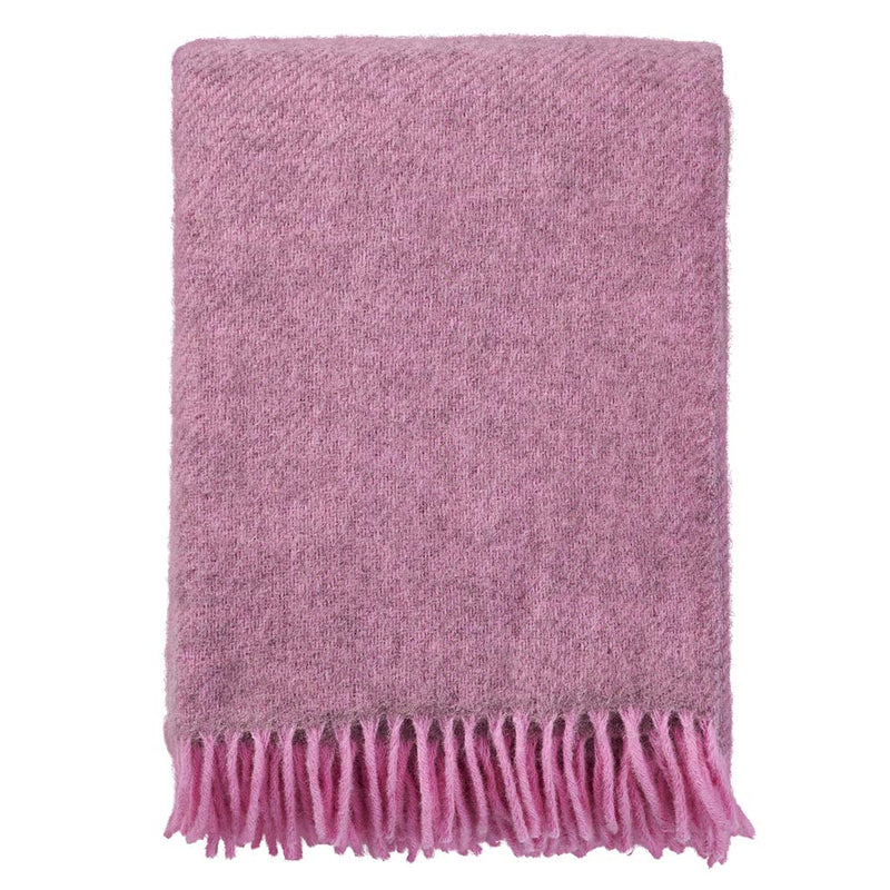 pinke Gotlanddecke zusammengefaltet, man sieht schön die Graumelierung, das Pink ist nicht schreiend
