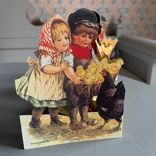 Leporello aus Papier mit Motiv Kinderpaar mit Korb voller Küken erhältlich bei MYS