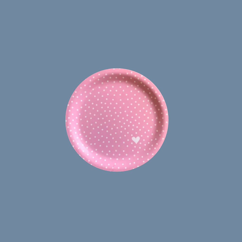 Vorderseite des Glasuntersetzers aus Holz mit Punkten rosa vor mysblauem Hintergrund