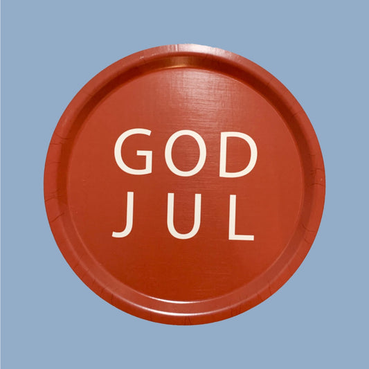 rundes Tablett in rot mit weißer Aufschrift God Jul