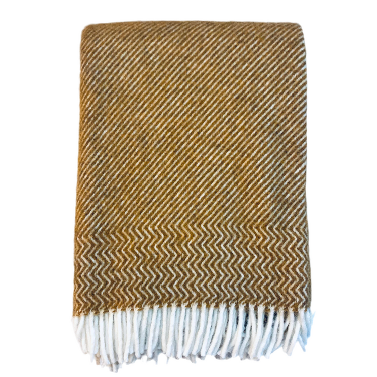 Klippan Wolldecke Bazaar cumin zusammengefaltet