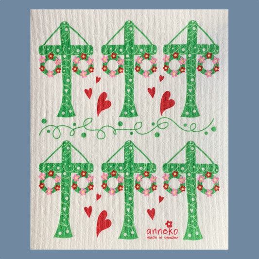 sechs grüne Mittsommerbäume geometrisch angeordnet mit rosa Blüten und roten Herzen auf schwedischem Spültuch vor mysblauem Hintergrund