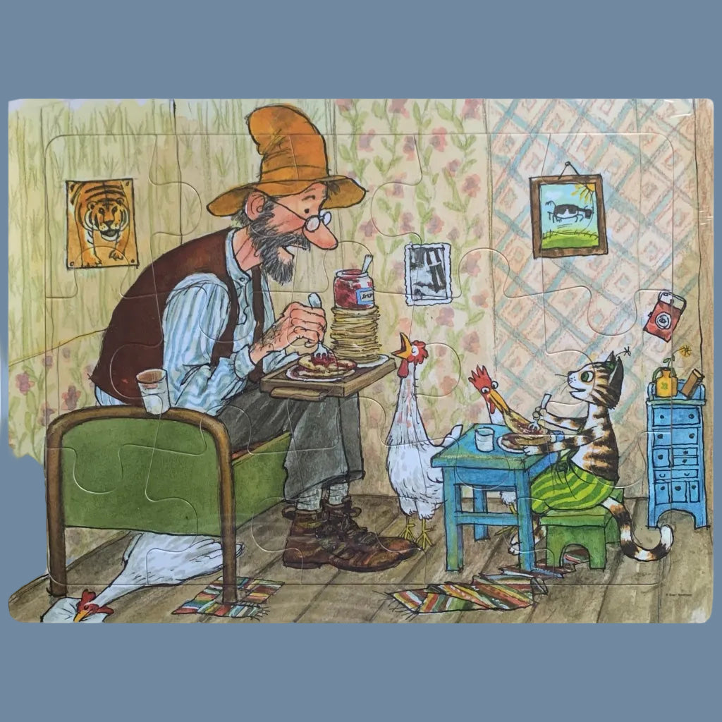 Rahmenpuzzle Pettersso und Findus essen Plinsen