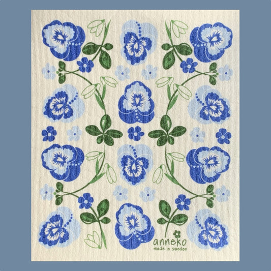 Schwedisches Spültuch mit Stiefmütterchenblüten und Schneglöckchen rankend dazwischen 