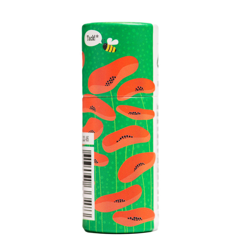 grüne Verpackung mit aufgedruckten Mohnblüten des Lippenbalsams Honig von Gusatf und Linnea