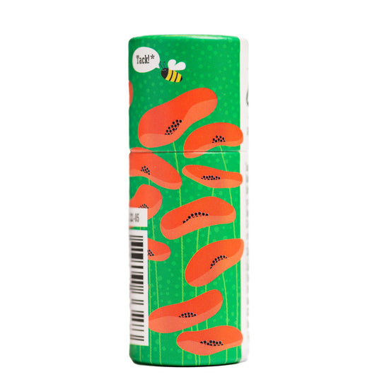 grüne Verpackung mit aufgedruckten Mohnblüten des Lippenbalsams Honig von Gusatf und Linnea